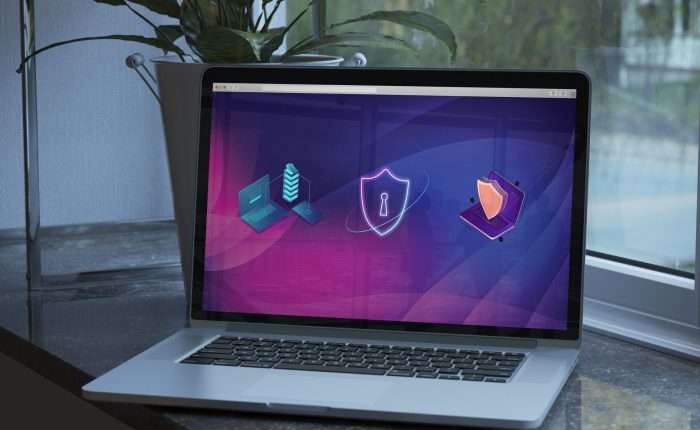 Managed Security icon including a shield can be seen on a laptop screen.