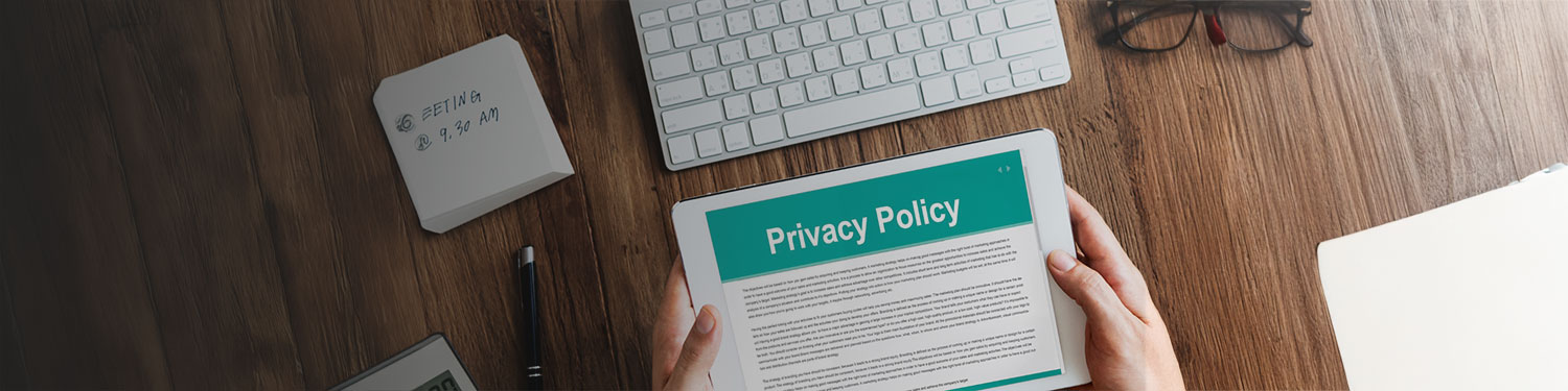 Tablet with the words Privacy Policy written.