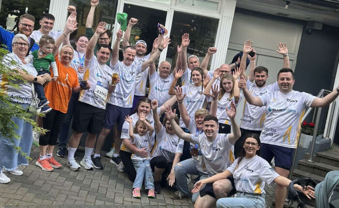 Peter O'Rourke family and friends wearing Bluescope-sponsored Arthritis Ireland jerseys at the Great Limerick Run 2026.