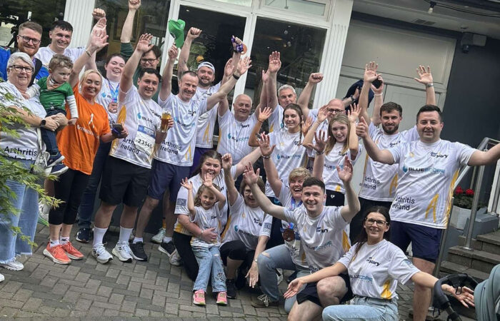 Peter O'Rourke family and friends wearing Bluescope-sponsored Arthritis Ireland jerseys at the Great Limerick Run 2026.