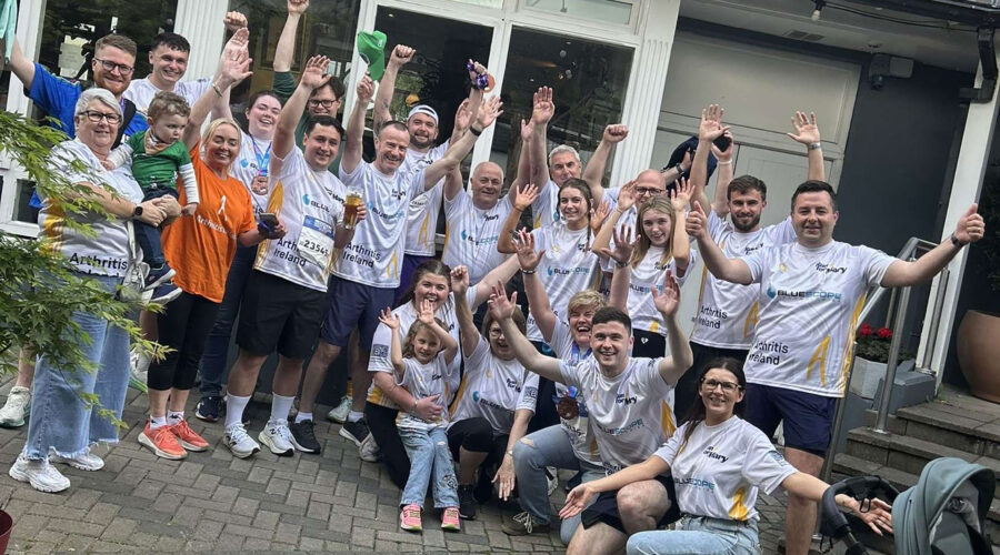 Peter O'Rourke family and friends wearing Bluescope-sponsored Arthritis Ireland jerseys at the Great Limerick Run 2026.
