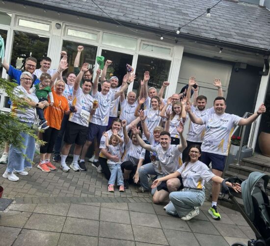 Peter O'Rourke family and friends wearing Bluescope-sponsored Arthritis Ireland jerseys at the Great Limerick Run 2026.