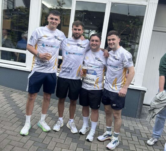 Peter O'Rourke family and friends wearing Bluescope-sponsored Arthritis Ireland jerseys at the Great Limerick Run 2026.