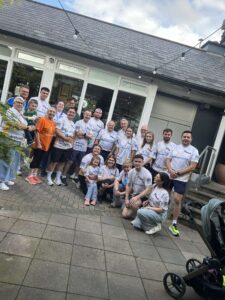 Peter O'Rourke family and friends wearing Bluescope-sponsored Arthritis Ireland jerseys at the Great Limerick Run 2026.